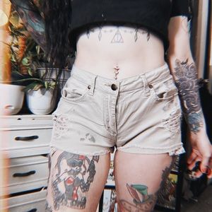 Grungy daisy duke paint splattered shorts